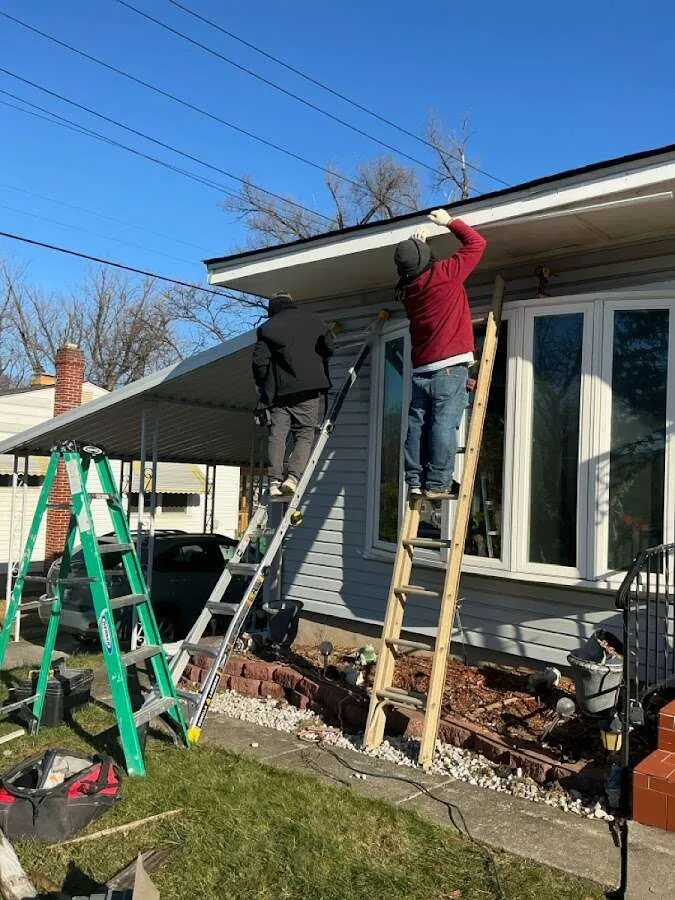 Restoration crew performing exterior repair in Augusta